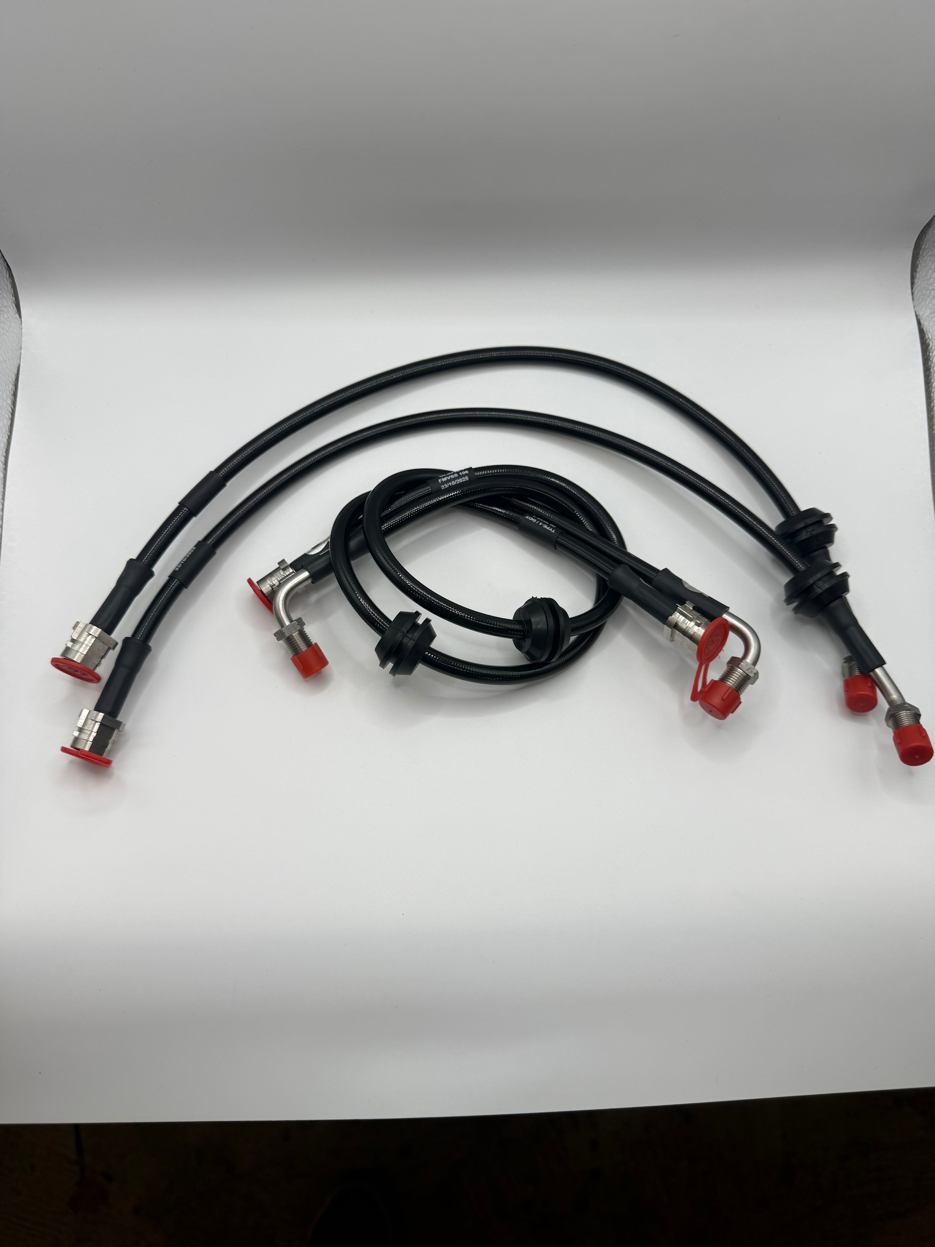 Black valve controller cables with silver connectors and red caps on white background, Eastwood Engineering UK performance parts