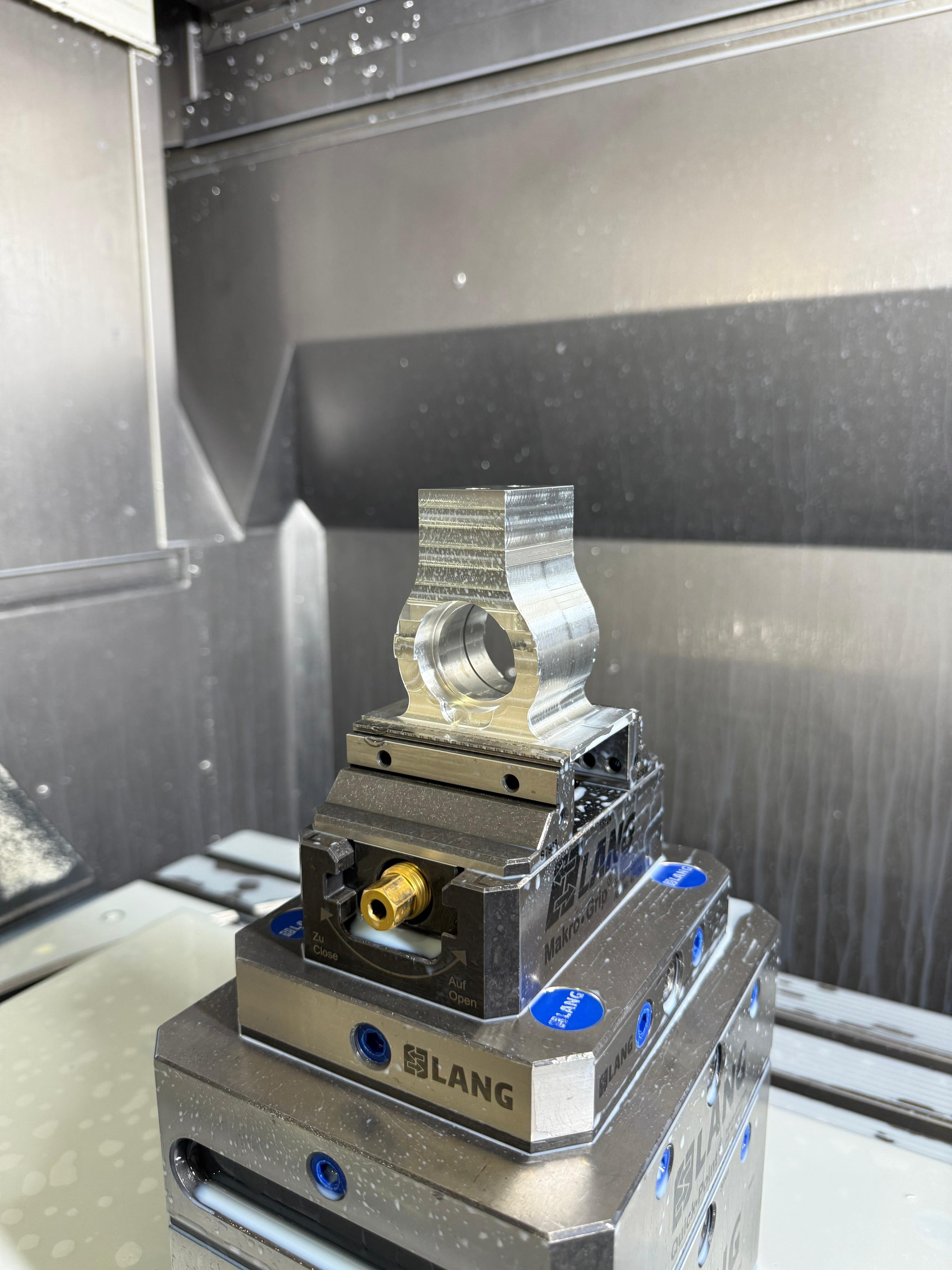 Precision-machined metal valve controller part in CNC milling machine, Eastwood Engineering UK